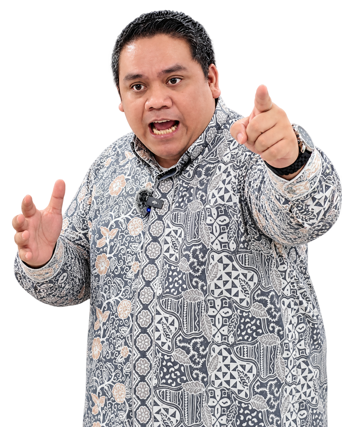 Man in a patterned shirt passionately speaking and gesturing.